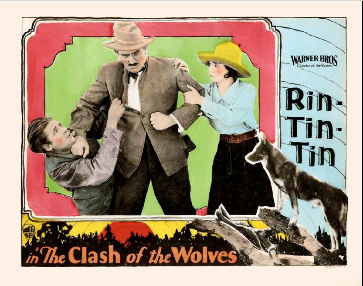 Lobby card for the American western film The Clash of the Wolves (1925) with Charles Farrell, Pat Hartigan, and June Marlowe as well as the dog Rin-Tin-Tin.