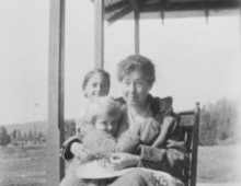 Alice and children in a rocking chair